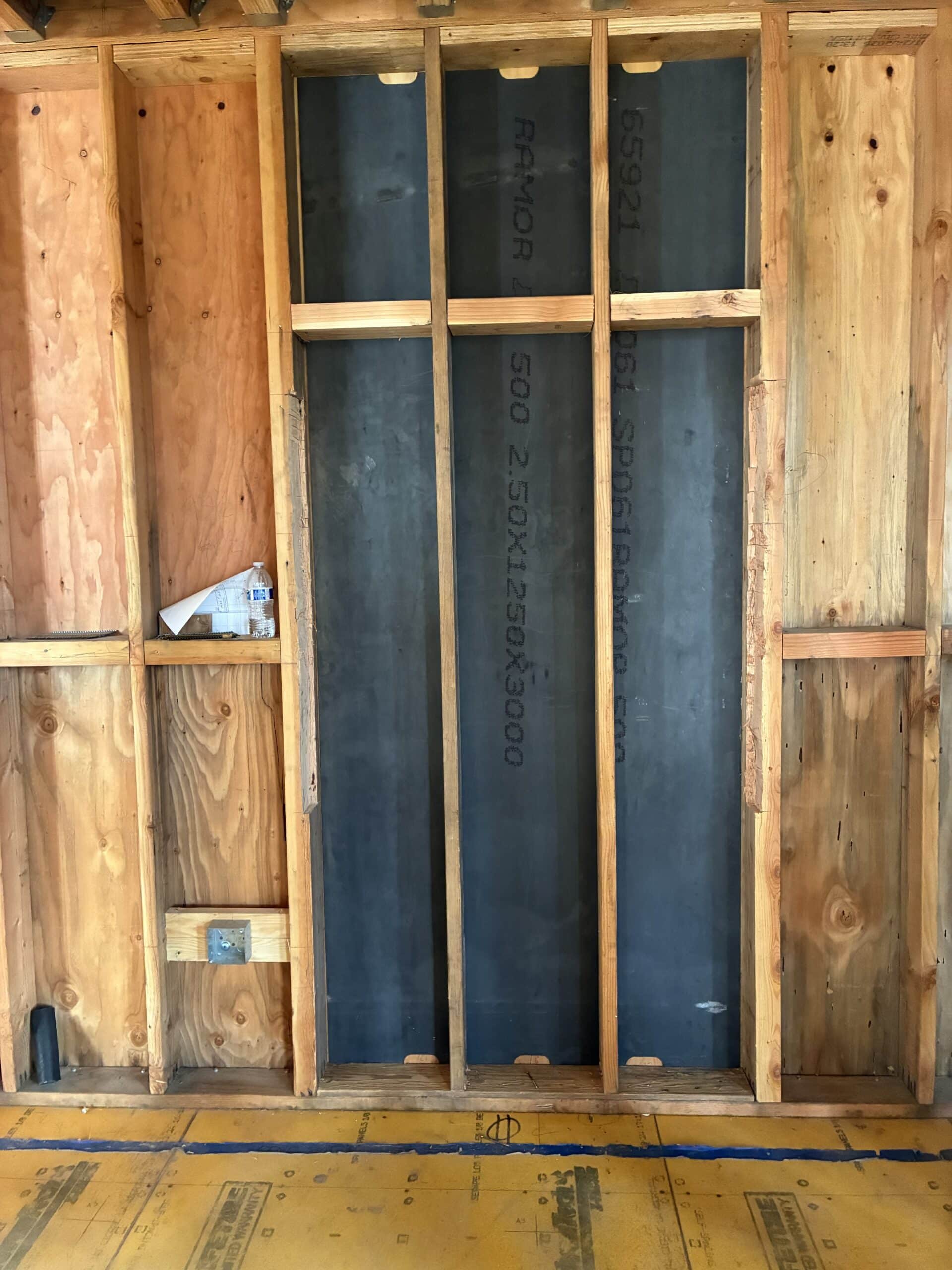 High-security steel wall panels installed behind metal studs