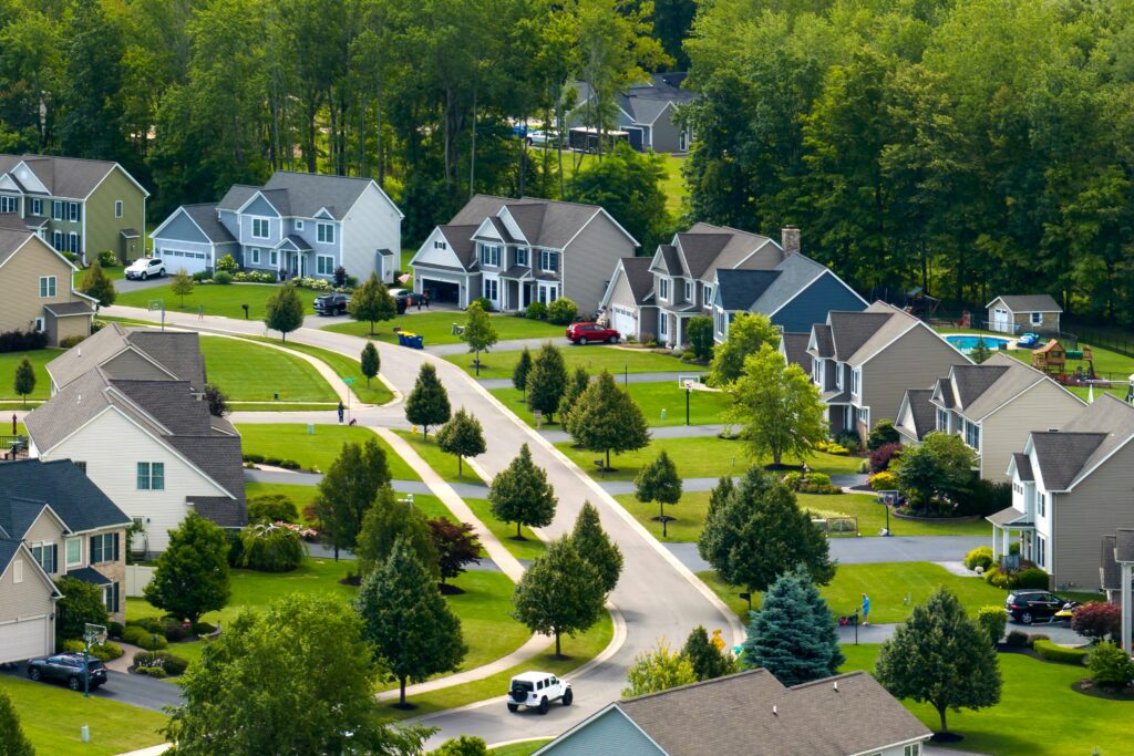 Aerial view of a suburban neighborhood in summer